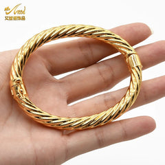 Luxurious African Jewelry: Gold-Toned Copper Bangle Bracelet for Women - Flexi Africa - Free Delivery - www.flexiafrica.com